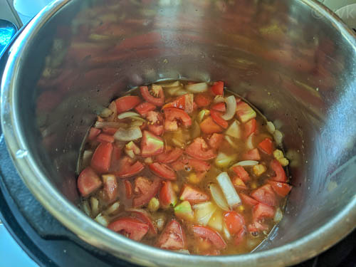 cooking onions and tomatoes