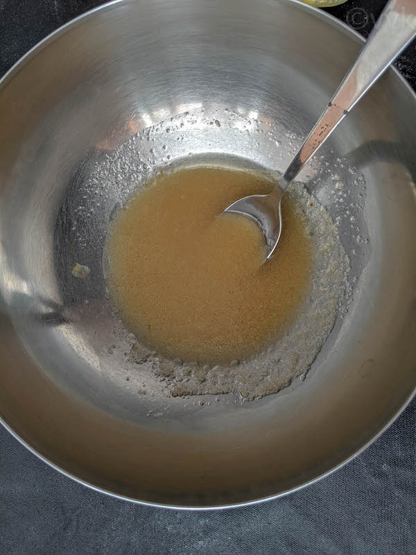 combining sugar with the wet ingredients