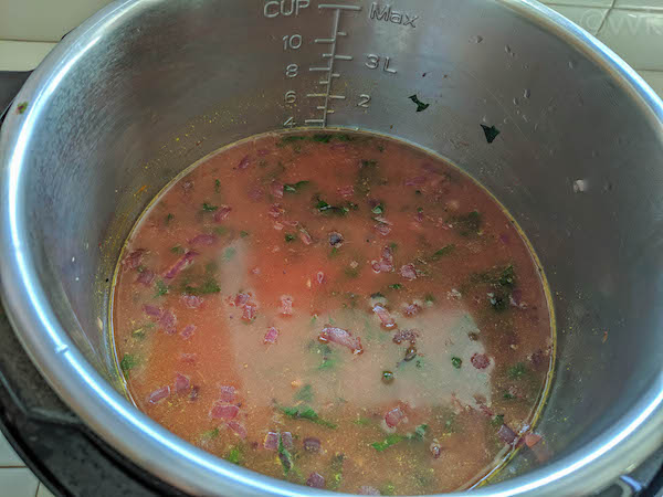 adding water to the dal