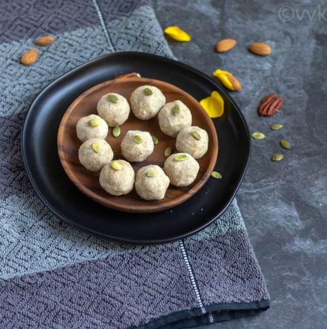 metta atta ladoo in a black and brown plate