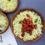 cauliflower rice with rajma curry on a wooden plate