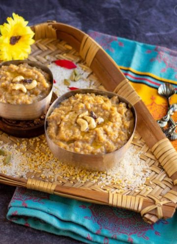 pressure cooker chakkarai pongal bowls placed in a muram