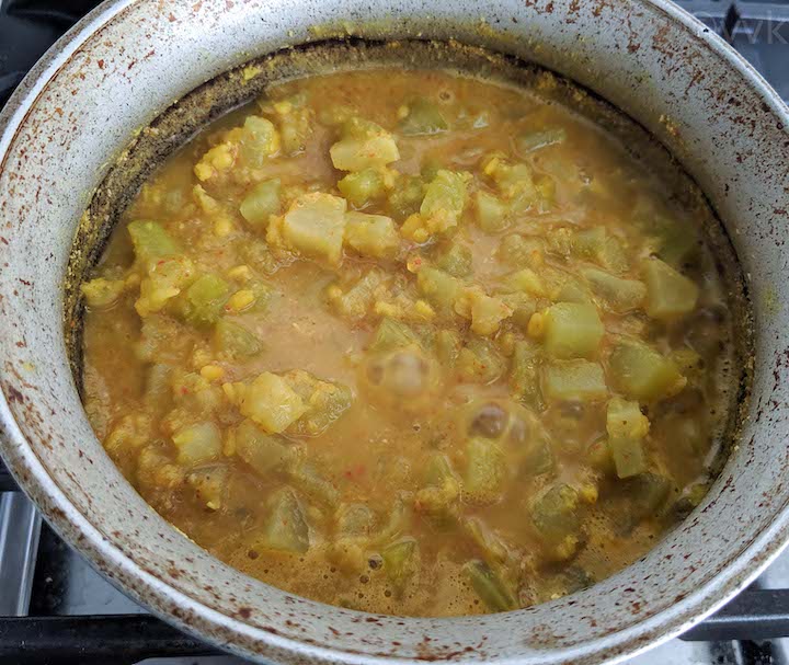 chow chow kootu simmering in a hindolium uruli