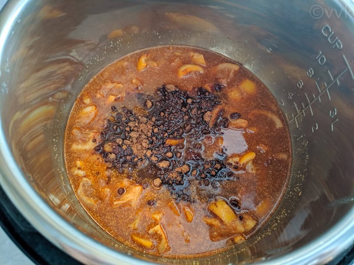 adding jaggery to the pickle