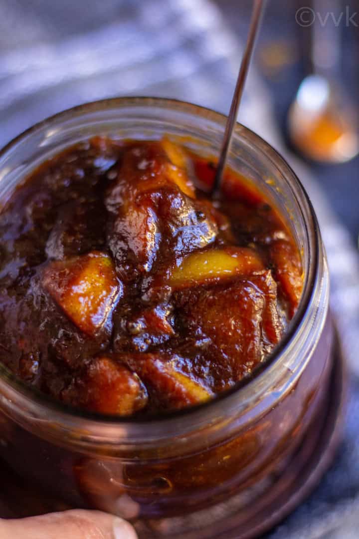 handhold shot of lemon pickle made in instant pot