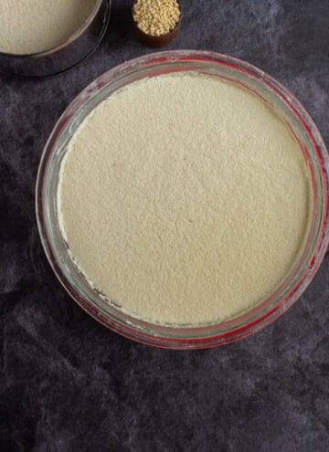 Fermented idli dosa batter in a glass bowl