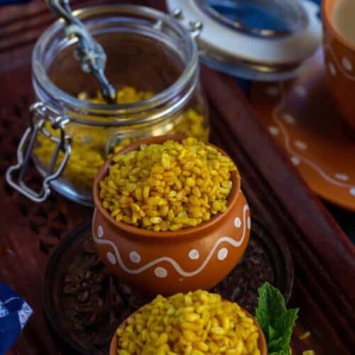 close of shot of moong dal chaat in a terracotta cup