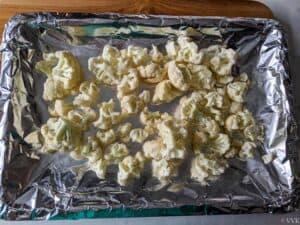 cauliflower lined in a baking tray