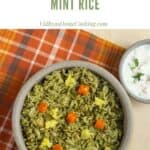 pudina rice topped with carrots and potato with text overlay for pinterest