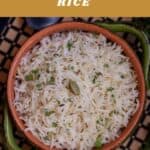 overhead shot of jeera rice with text overlay for pinterest