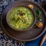 square image of zucchini dal in a ceramic plate