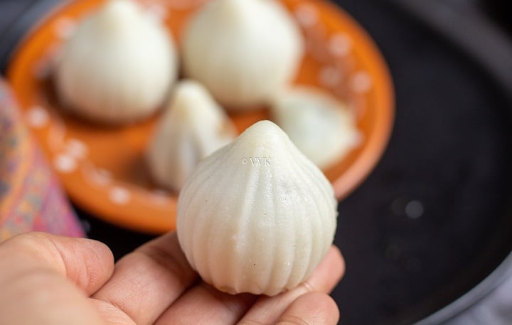close up shot of the modak held in hand