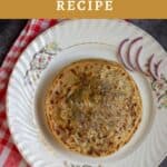 stuffed paratha recipe on a white plate with text overylay for pinterest