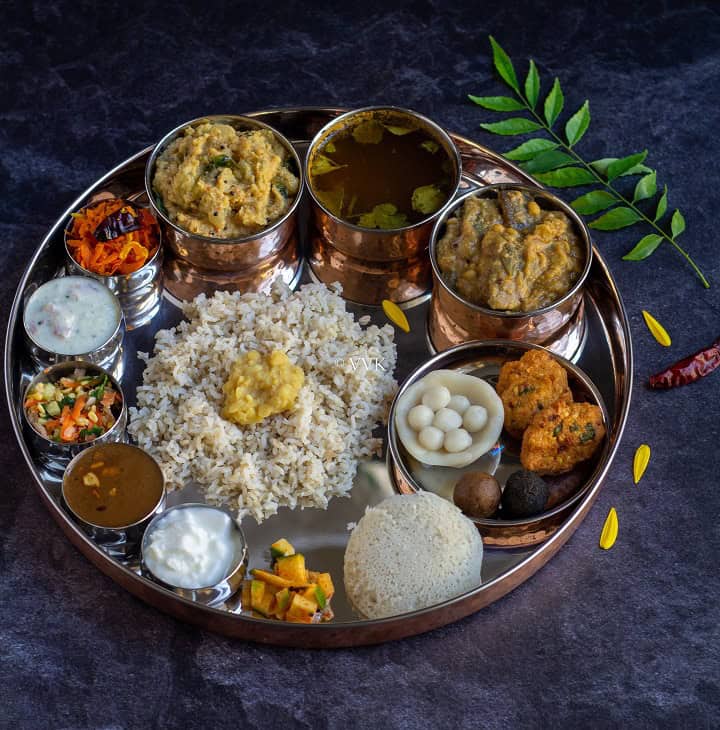 elaborate lunch menu recipes for garuda panchami with curry leaves on the side as garnish