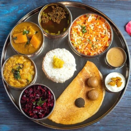 square image of indian festive thali or spread