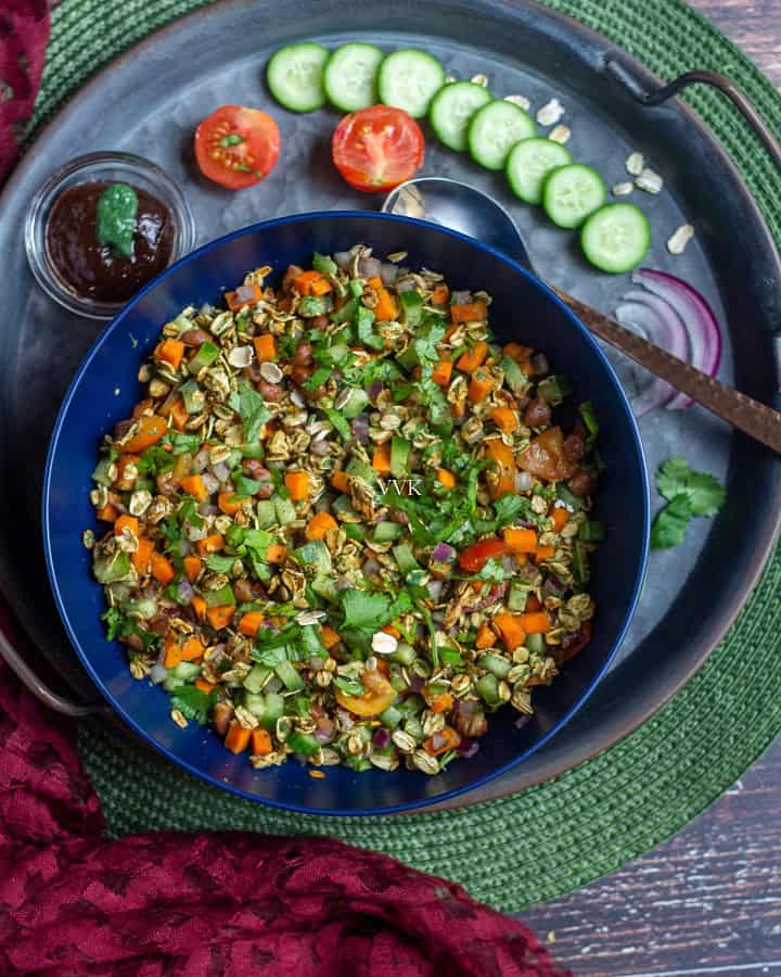 overhead shot of oats bhel in a blue bowl