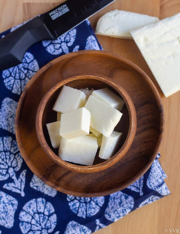 overhead shot of paneer in wooden bowl