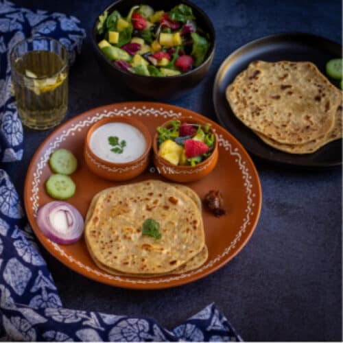 paneer paratha spread with