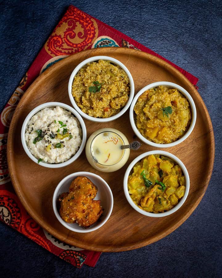 Quinoa platter with rasam rice, sambar rice, yogurt rice, kheer and vadai