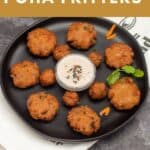 aval vadai with chutney in a black plate placed on a white fabric with text overlay for pinterest