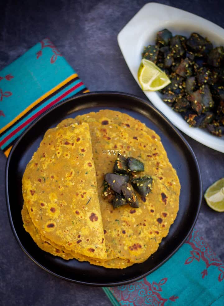 overhead shot of zucchini thepla with batata nu shaak