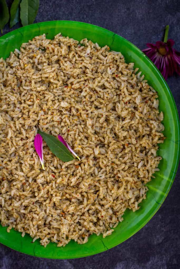 close up shot of sesame seed rice served in green plate