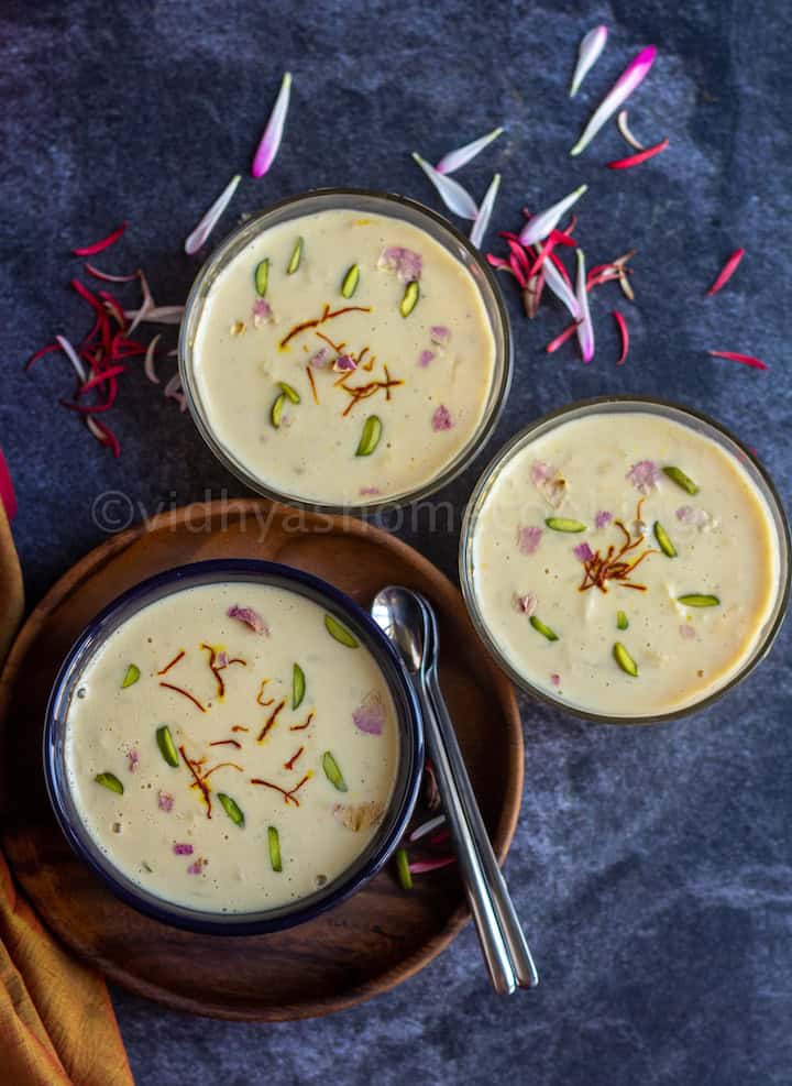 overhead shot of apple basundi served in three bowls