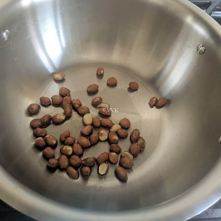 roasting the peanuts for poha