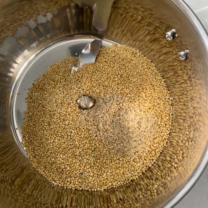 adding cooled down millets to the mixer