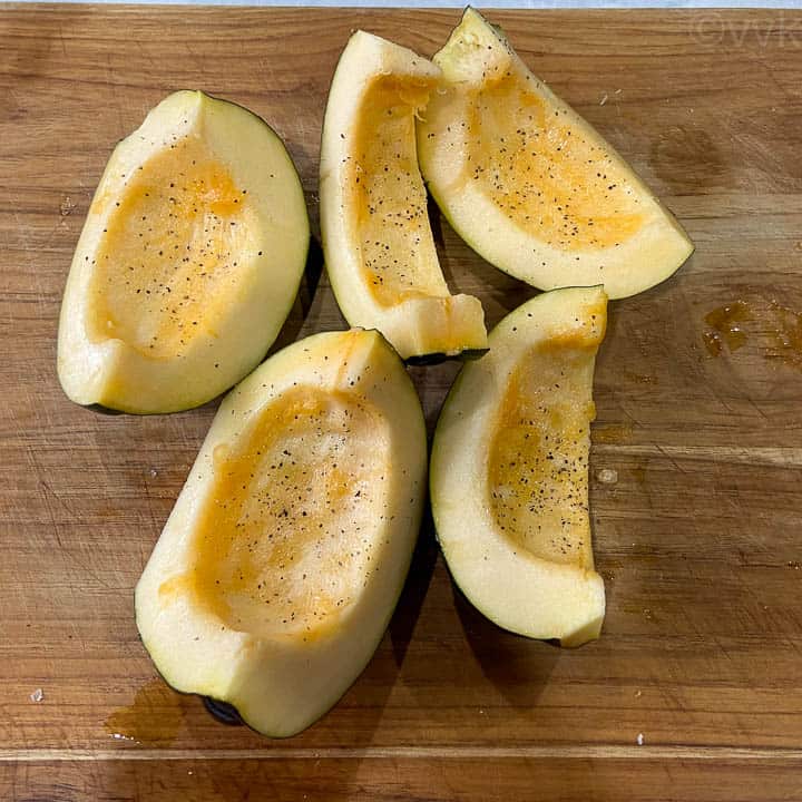 acorn squash slices seasoned with salt and pepper