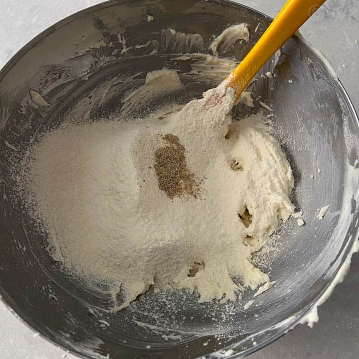 add the flour and ground cardamom