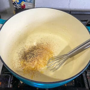 adding remaining cheese and spices