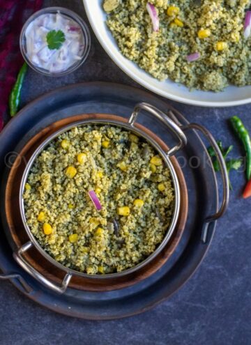 square image of millet palak pulao served on a kadai stacked on trays