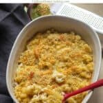 baked mac and cheese in a casserole with text overlay