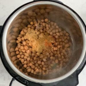 adding chickpeas and spices