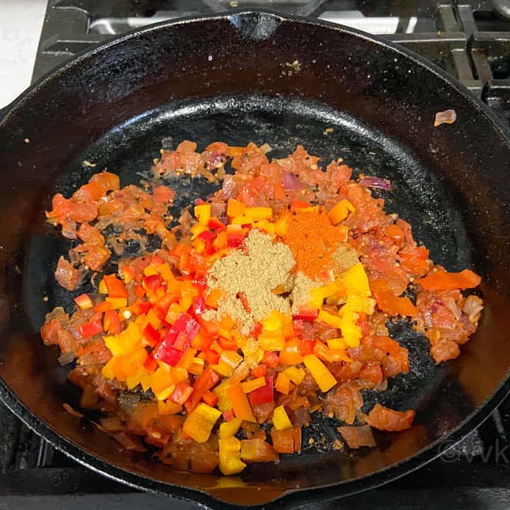 adding bell peppers and spices