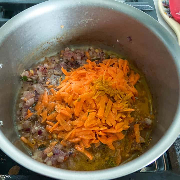 adding grated carrots