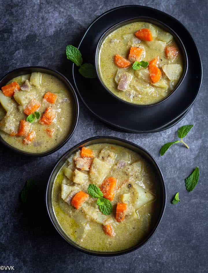 overhead shot of turnip kurma served in 3 black servewares