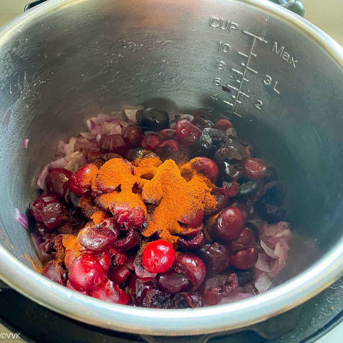 adding cherries and spices