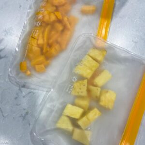 freezing the chopped mangoes and pineapples