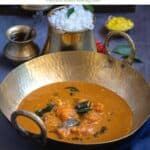 pumpkin sambar served with rice and toor dal with text overlay for pinterest
