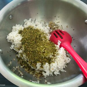 adding rice and podi
