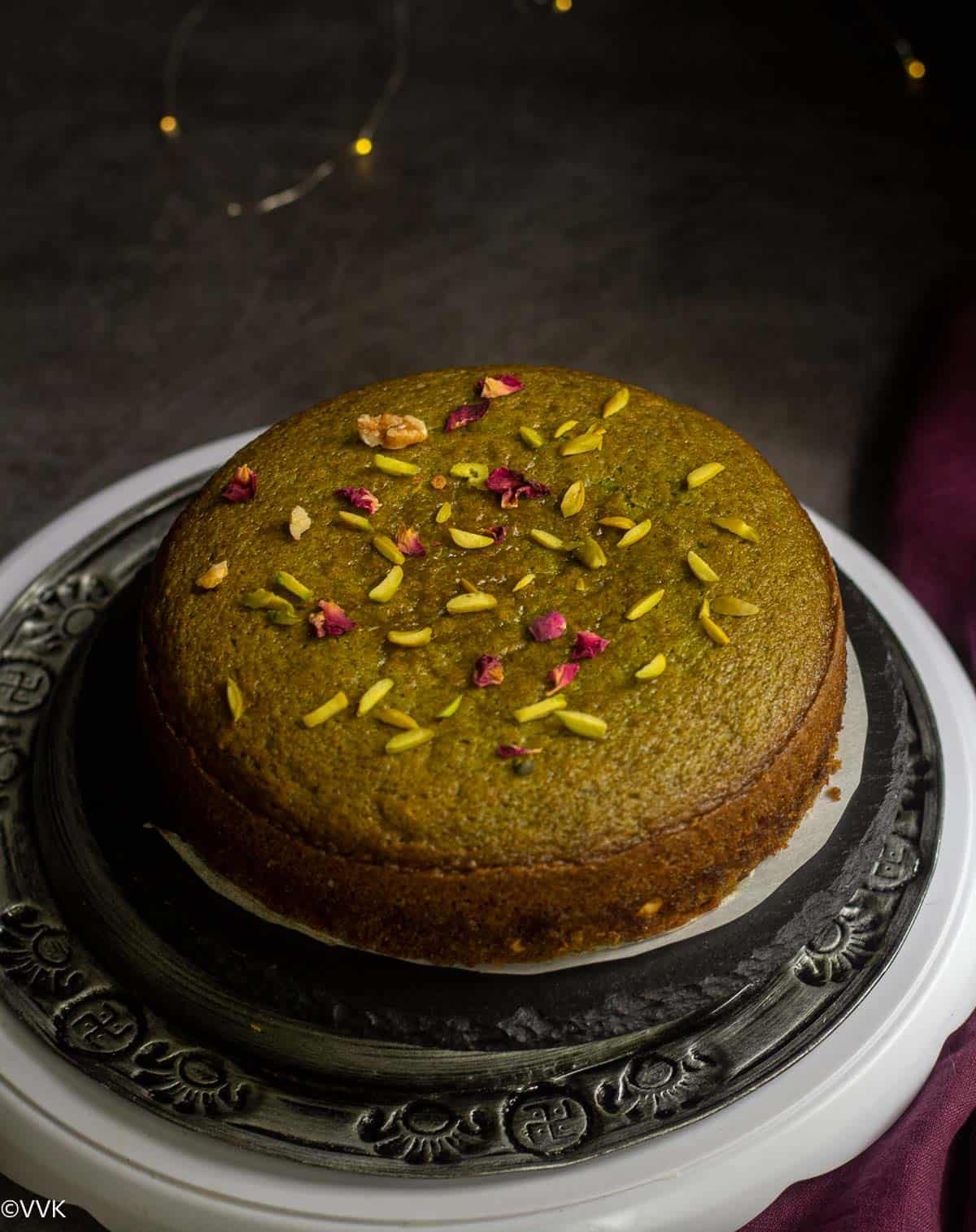 vegan paan cake served on a cake stand