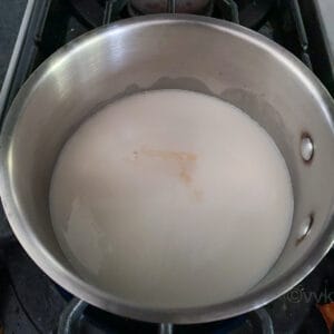 bringing almond milk to a gentle boil