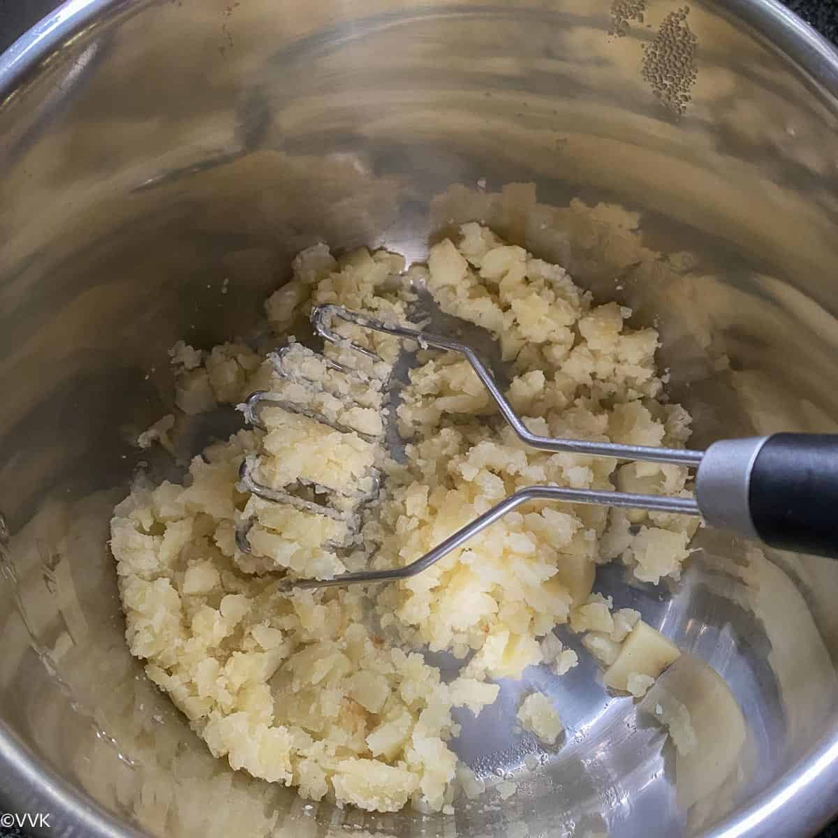 mashing the potatoes roughly
