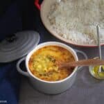 dal tadka served in a small casserole with rice
