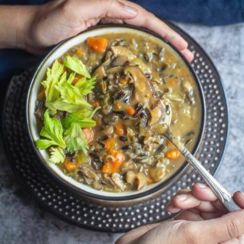 square image of vegan mushroom and wild rice soup