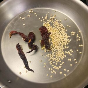 roasting red chilies and urad dal