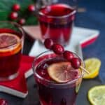 cranberry juice mocktail with text overlay for pinterest