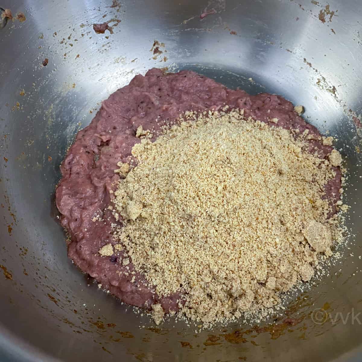 adding the nut mix to the sauteed onion masala